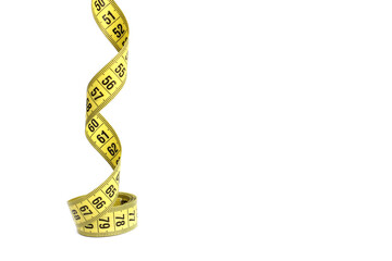 Yellow measuring tape twisted, isolated on a white background
