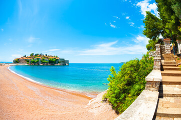 Sveti Stefan island with beautiful beach in Montenegro. Luxury resort at Adriatic sea. Panoramic view. Famous travel destination