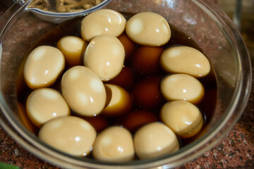 Bowl of Medium-Boiled Eggs, marinated in a Japanese sauce containing Soy and Mirin