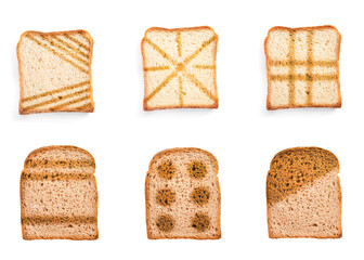 Set with toasted slices of wheat bread on white background, top view