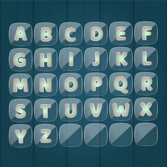 A to Z alphabet gold words game transparent glass plate and background wood color blue.