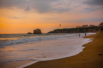 Breathtaking view of Biarritz Lighthouse (Faro de Biarritz) and the Atlantic ocean during sunset, Pays Basque, France