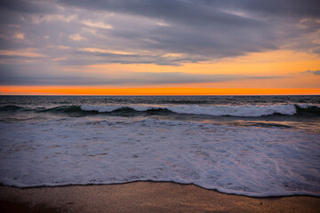 Breathtaking sunset on the beach by Atlantic ocean, Biarritz, France