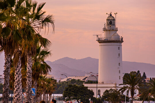  La Farola - Malaga lighthouse at sunset, Andalusia, Spain