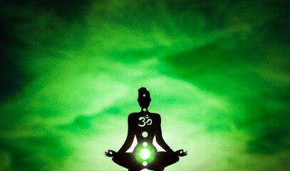 Illustration of a figure showing chakras - The color Green shows the Heart chakra - obrazy, fototapety, plakaty