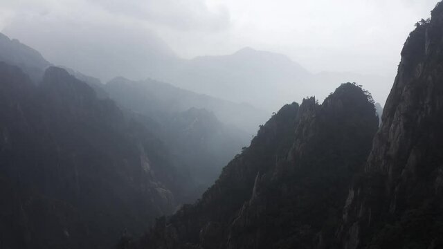 Huangshan Yellow Mountain peaks in cloud cover, Anhui province China, aerial view
