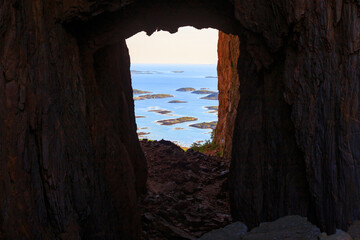 View through a hole in the mountain in Norway, Torghatten