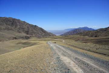Dirt road among the mountains. Kazakhstan