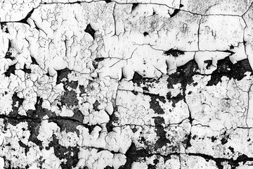 Texture of a concrete wall with cracks and scratches which can be used as a background