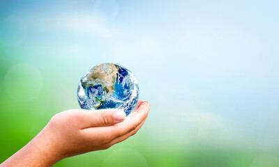 World Environment Day concept: Corona virus or COVID-19 Earth wearing a mask , this image furnished by NASA