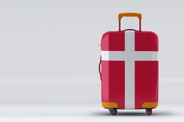 Denmark flag on a stylish suitcases back view on color background. Space for text. International travel and tourism concept. 3D rendering.