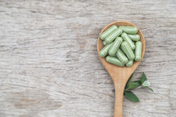 Herbal capsules from green herb for health care eating 