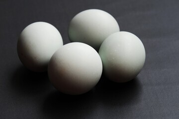 A salted duck egg on black isolated background