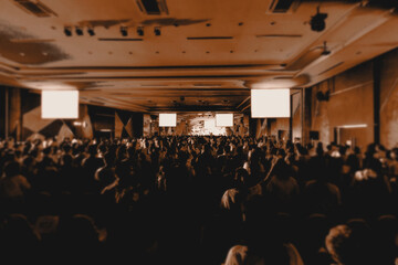 Silhouettes of concert crowd. Dark background