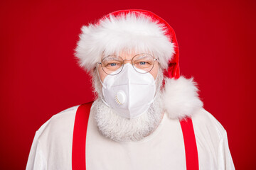 Closeup photo portrait old aged santa talk children skype work wear respirator mask headwear shirt...