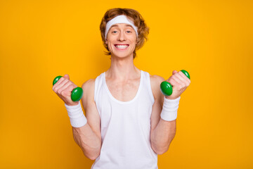 Close-up portrait of his he nice attractive funky glad cheerful cheery guy doing work out with...