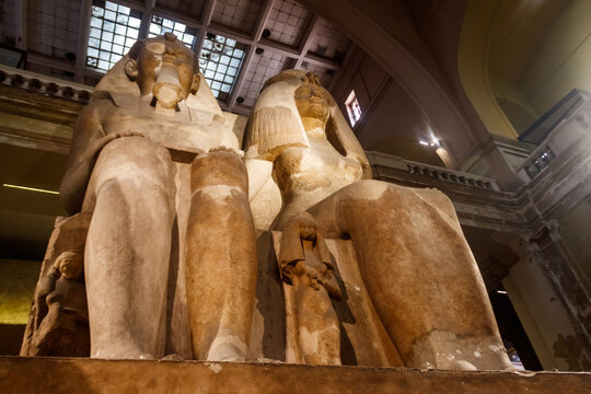 Colossal statues of Amenhotep III and Queen Tiye and their daughter Henuttaneb  in the Museum of Egyptian Antiquities in Cairo, Egypt