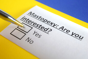 Fototapeta premium One person is answering question about mastopexy.