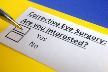 Obraz premium One person is answering question about corrective eye surgery.
