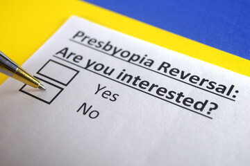 Fototapeta premium One person is answering question about presbyopia reversal.