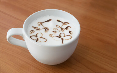 Cup with milk bubble foam