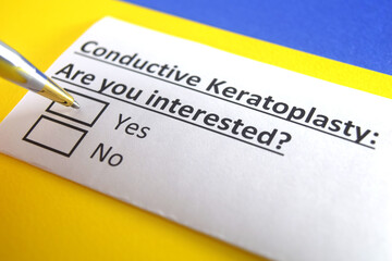 Fototapeta premium One person is answering question about conductive keratoplasty.