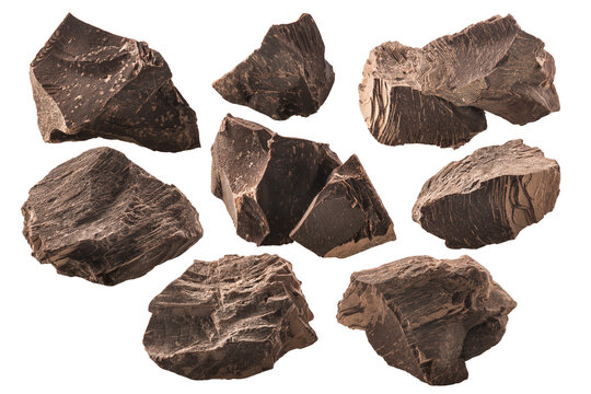 Chunks of roughly crushed chocolate or solid cocoa mass, isolated w clipping paths