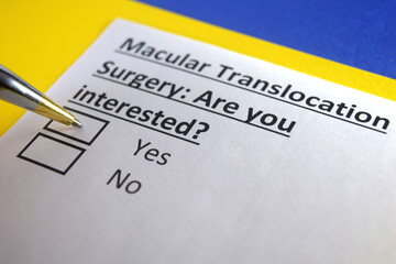 Obraz premium One person is answering question about macular translocation surgery.