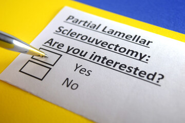 Obraz premium One person is answering question about partial lamellar sclerouvectomy.
