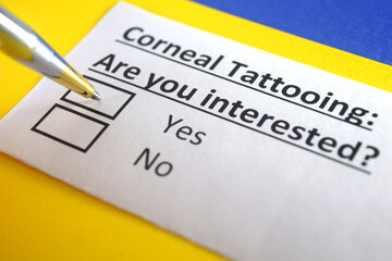 One person is answering question about corneal tattooing.