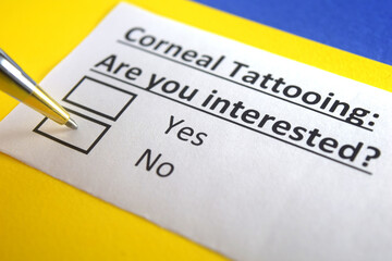 One person is answering question about corneal tattooing.