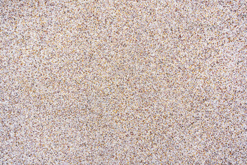 Close up surface of texture of small stone or sand wall background