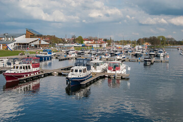 Fototapeta na wymiar Marina and motor boats in Gizycko. Masuria famous touristic city in Poland. 