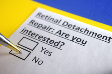 Obraz premium One person is answering question about retinal detachment repair.