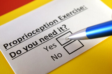 Obraz premium One person is answering question about proprioception exercise.