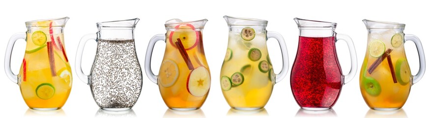 Iced beverages and cocktails or lemonades in glass pitchers, a set of, isolated w clipping paths