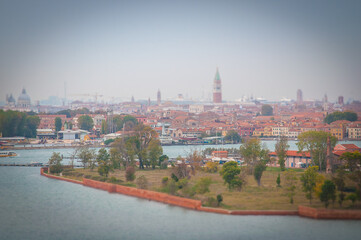 Certosa island with Venice background tilt shift effect, Venice, Italy. Concept: historic Italian...