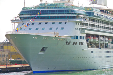 Royal Caribbean cruiseship or cruise ship liner MS Rhapsody of the Seas at terminal in port of...
