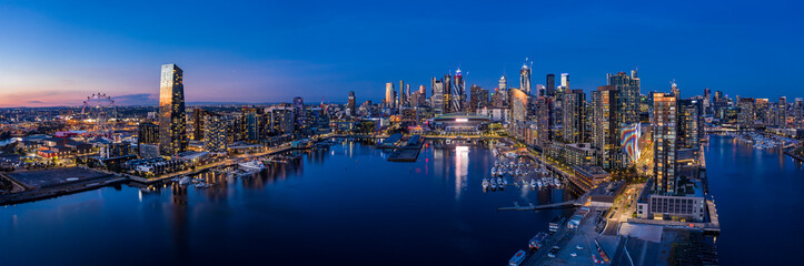 Naklejka premium Aerial view of Melbourne's docklands precinct with the CBD in the background