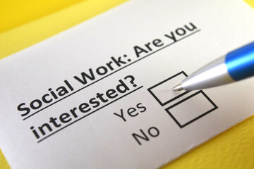 Obraz premium One person is answering question about social work.