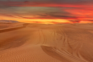 Fototapeta na wymiar Desert red sunset sand dunes, United Arab Emirates, Dubai