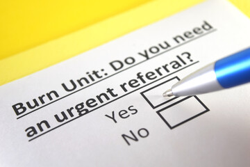 One person is answering question about burn unit.