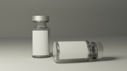 Vial glass bottles with white blank labels.
