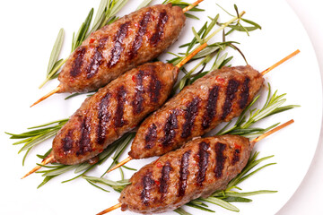 Lula kebab, lyulya-kebab minced meat. grilled with rosemary. Fast food