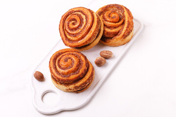 Danish cinnamon buns or cinnabons. Sweet, homemade pastry