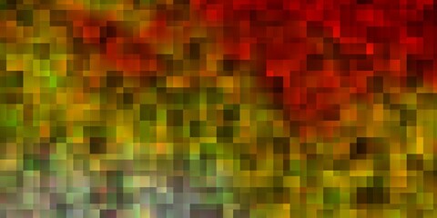 Fototapeta premium Light Orange vector background in polygonal style.
