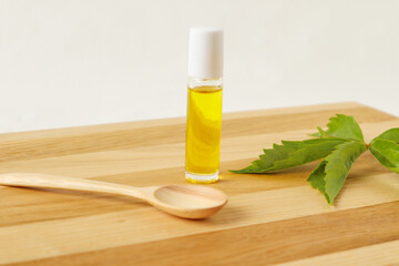  Hemp oil on a cutting Board with a wooden spoon - a concept of dietary nutrition.