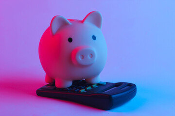 Piggy bank and clock, calculator in trendy neon light. Gradient pink-blue glow. Concept art....