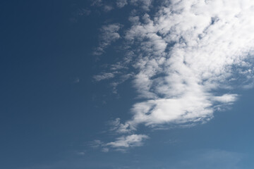 white clouds on a blue sky - place for text