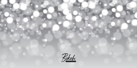 Fototapeta premium Abstract background with bokeh effect. Blurred defocused lights in white colors. Vector illustration.